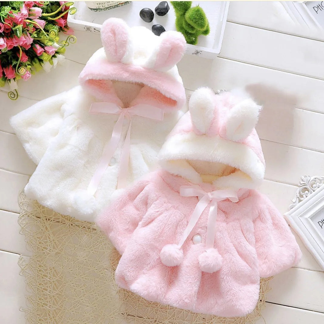 Children's wool cape and ear fleece jacket by Baby Bubble in soft, cozy fabric, perfect for keeping kids warm and stylish.