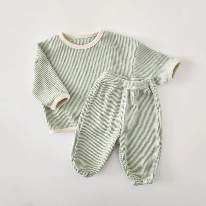 Baby Bubble Korean Waffle Suit, comfy 2-piece set with waffle fabric, featuring a cozy top and matching pants for infants.