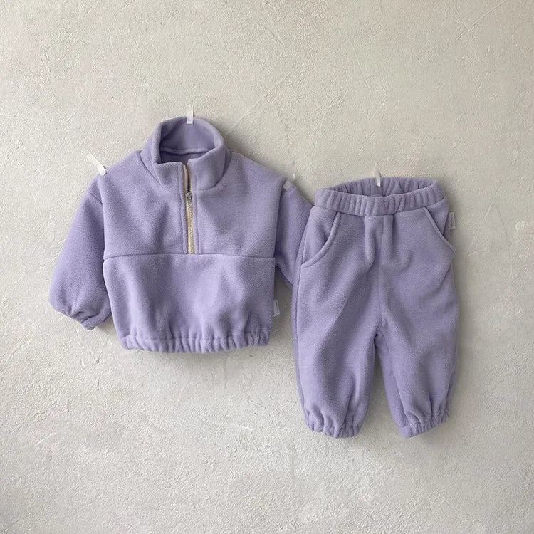 Toddler sports suit by Baby Bubble featuring a cozy fleece hoodie and matching pants, perfect for comfortable play.