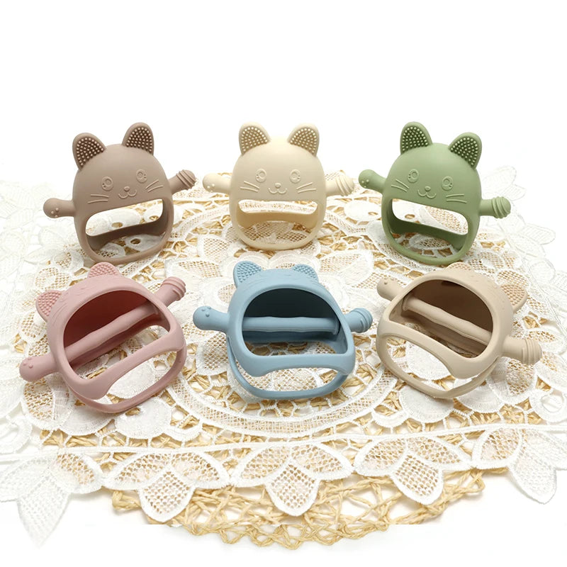 Baby Bubble silicone glove teether in soft blue, designed for soothing relief and easy gum massage for infants.