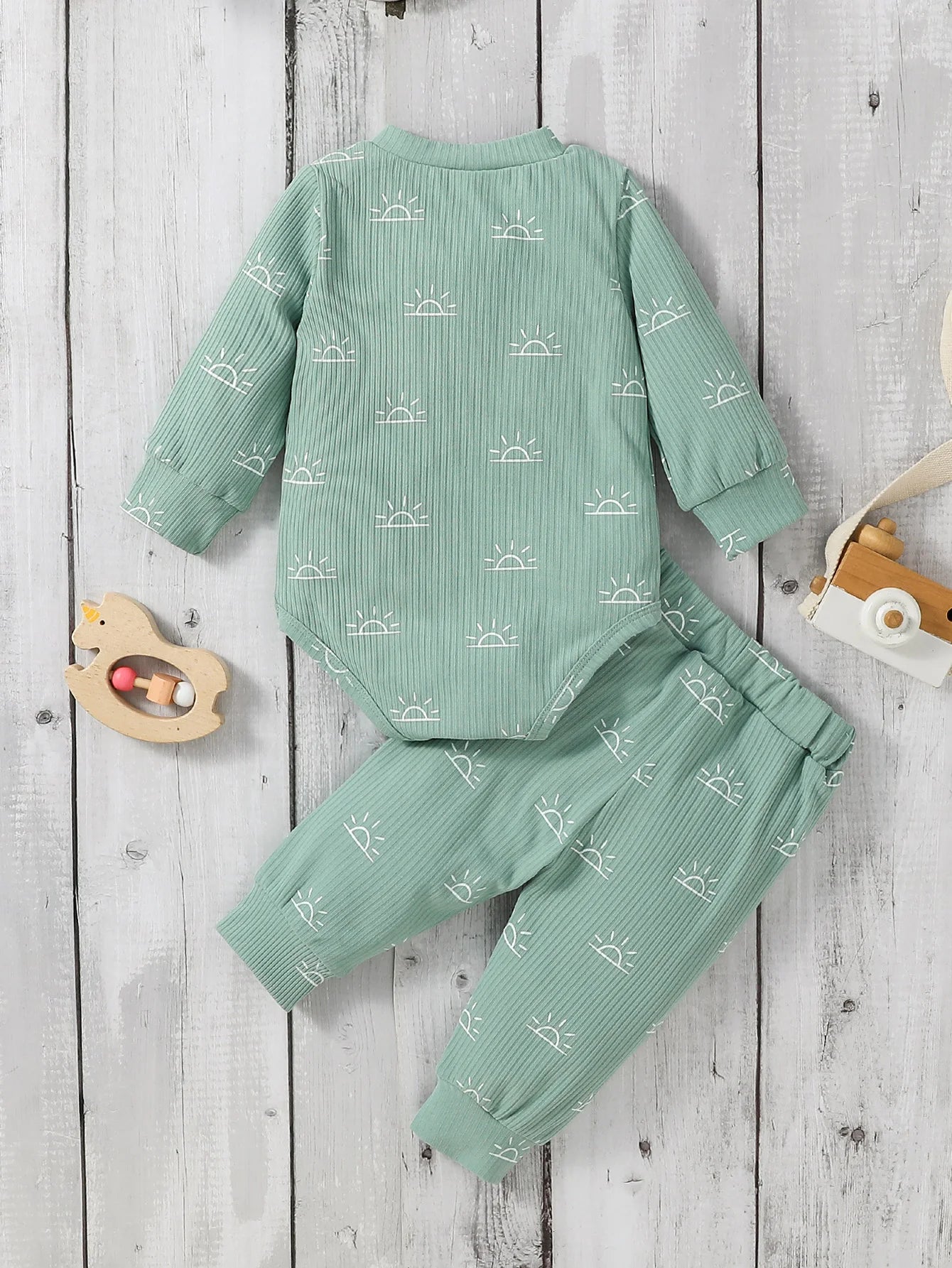 Baby boy outfit featuring a Baby Bubble 2-piece jumpsuit and pants, soft and comfortable for everyday wear.
