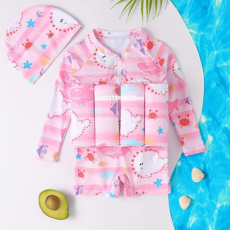 Children's buoyancy swimsuit with cartoon print by Baby Bubble, featuring bright colors and playful ocean-themed design.