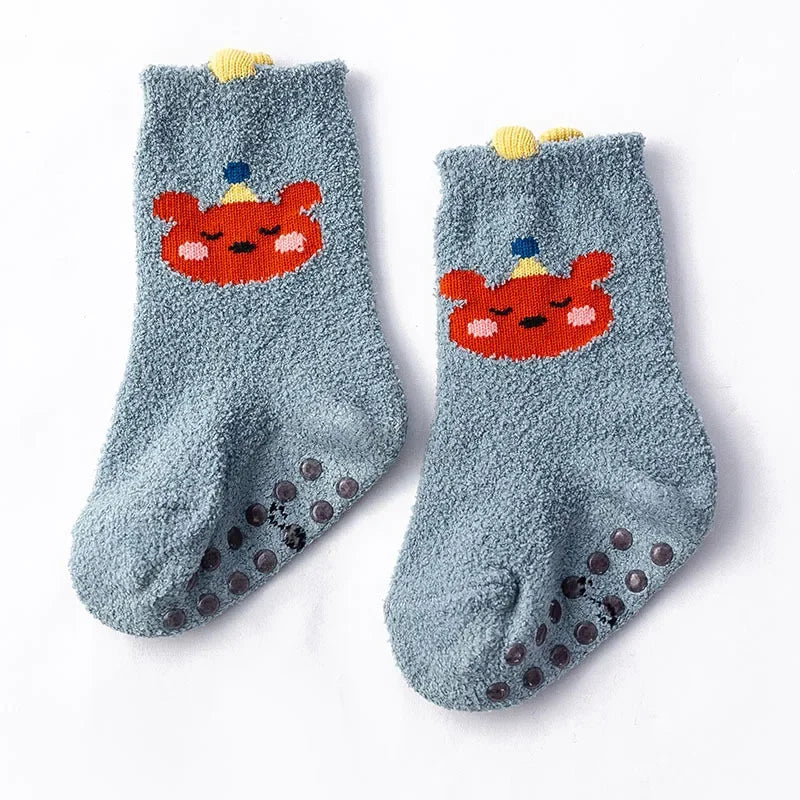 Baby Bubble baby dinosaur socks featuring colorful, soft knit fabric with dinosaur patterns and ribbed cuffs for comfort.