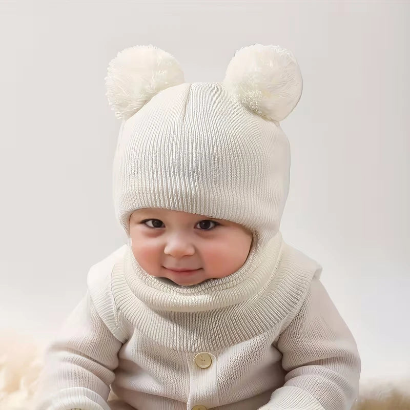 Baby Bubble winter children's hooded knitted cap, cozy and warm for kids, featuring a soft, colorful knit design.