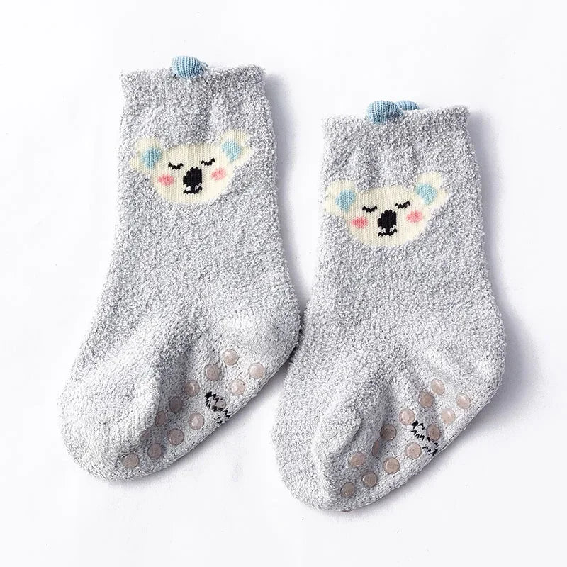 Baby Bubble baby dinosaur socks showing soft, colorful fabric with dinosaur patterns and a snug fit for infants.