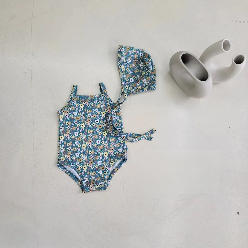 Baby Girl swimwear set by Baby Bubble, one-piece swimsuit with matching sun hat, perfect for summer beach outings.