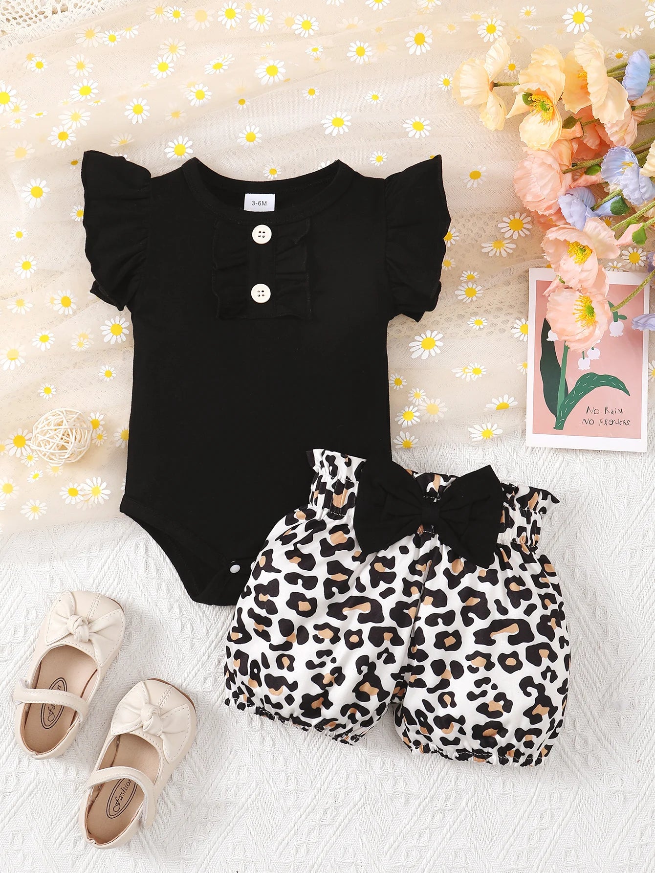 Baby Bubble summer baby jumpsuit set in leopard print, featuring playful design and comfortable fabric for little ones.