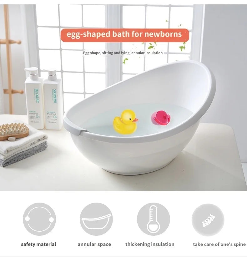 Egg-shaped Baby Bubble bathtub for newborns, featuring a safe, ergonomic design with soft, cushioned interior for gentle bathing.