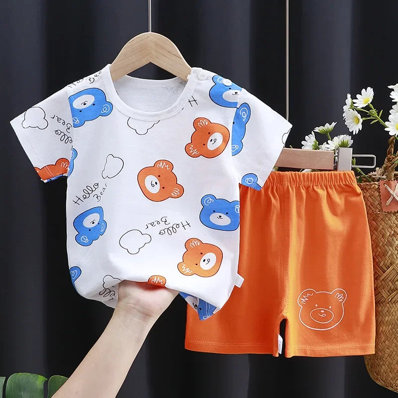 Baby Bubble cartoon print contrast T-shirt and shorts set featuring colorful cartoon characters on a white shirt and matching shorts.