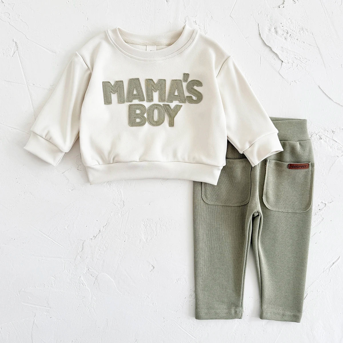 Baby Bubble MAMA'S BOY graphic sweatshirt set for babies, featuring a warm, cozy sweatshirt and matching pants.