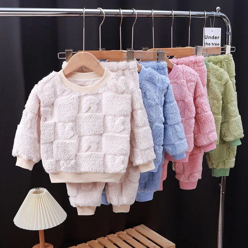 Children's autumn and winter flange pajamas suit by Baby Bubble, featuring cozy velvet fabric for boys and girls, warm home wear.