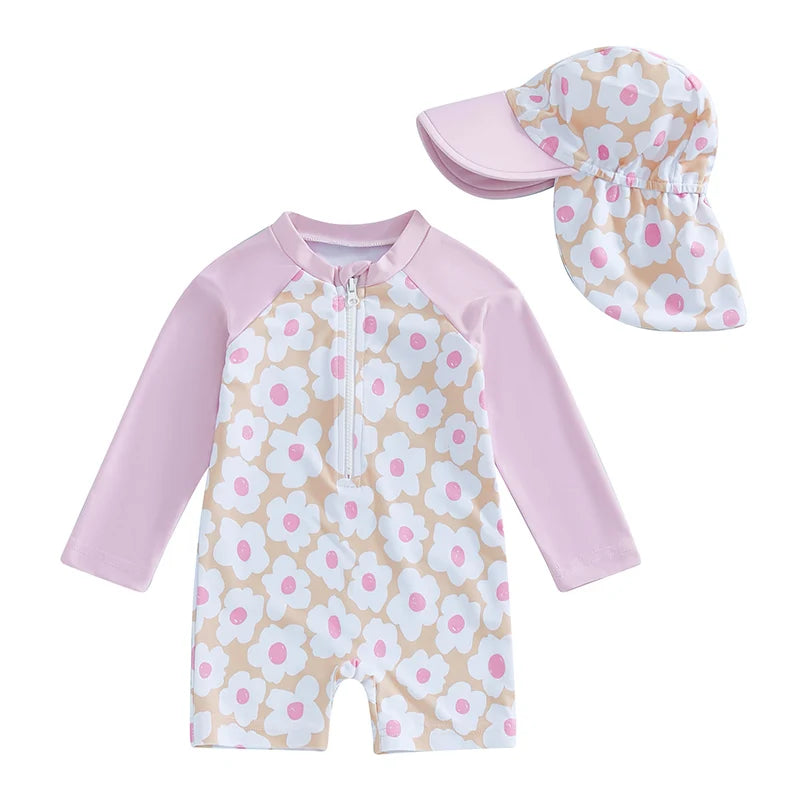 Baby Girl's rash guard set by Baby Bubble featuring floral and flamingo print, with long sleeves and vibrant summer colors.