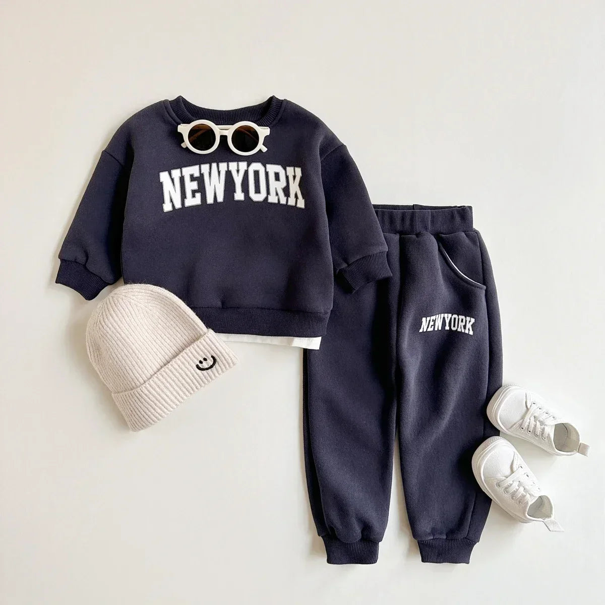 Baby Bubble baby winter outfit with a New York print top and matching pants, cozy and stylish for cold weather.
