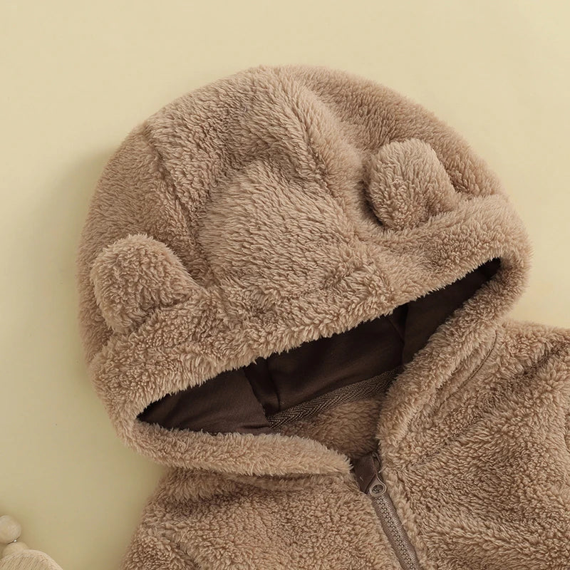 Baby Bubble baby hooded plush romper in soft, warm fabric with a cozy hood, perfect for winter comfort and cuddly warmth.