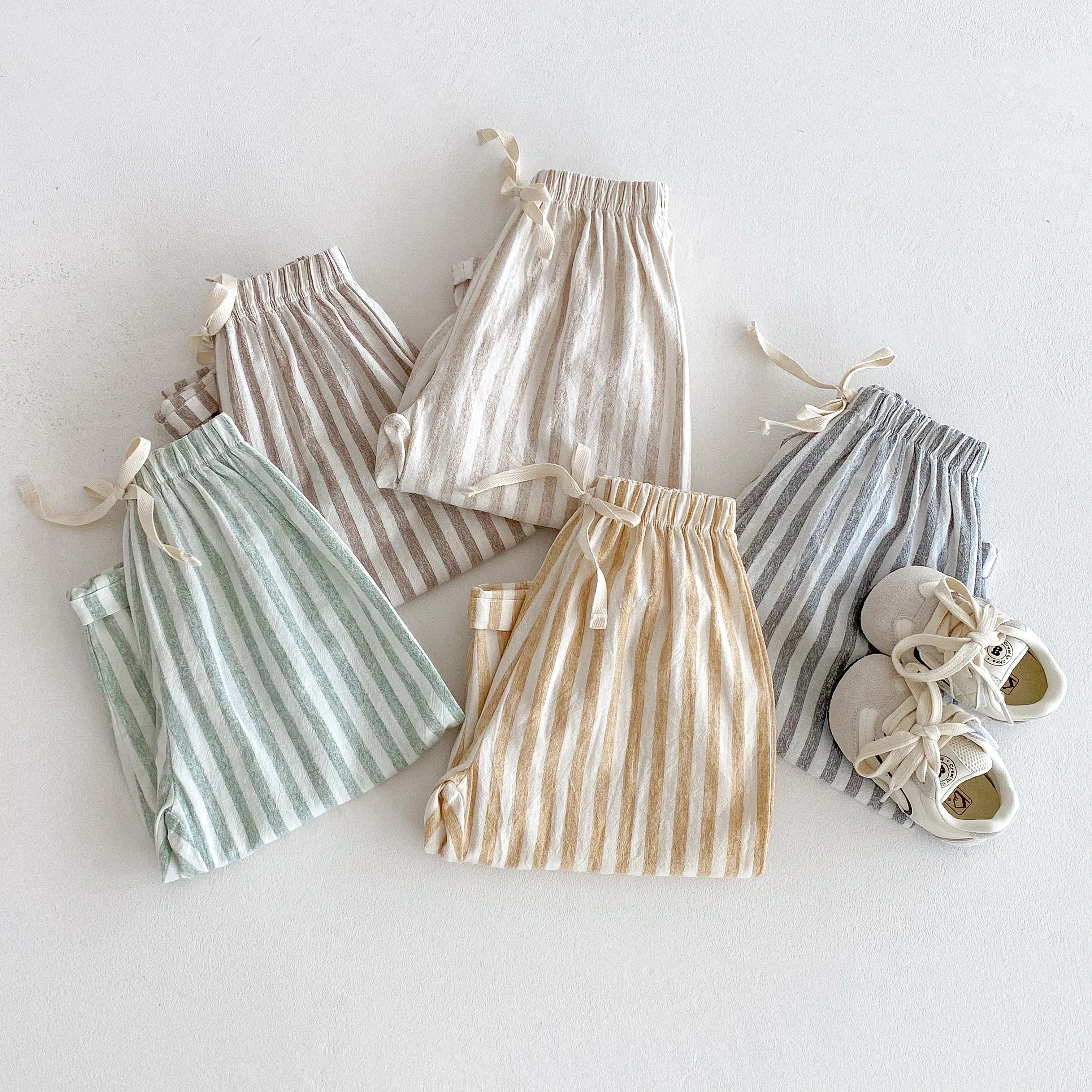 Baby Bubble toddler pants featuring colorful striped trousers, soft and comfortable for little ones, shown in a playful design.