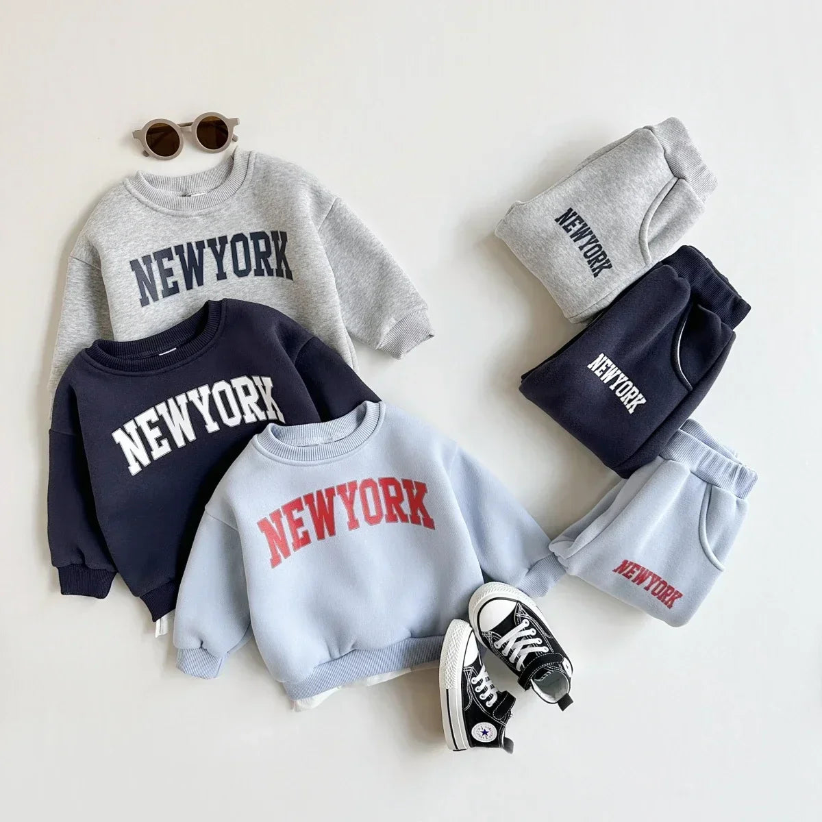 Baby Bubble winter baby 2-piece set with New York print top and matching pants, cozy and stylish for cold weather.