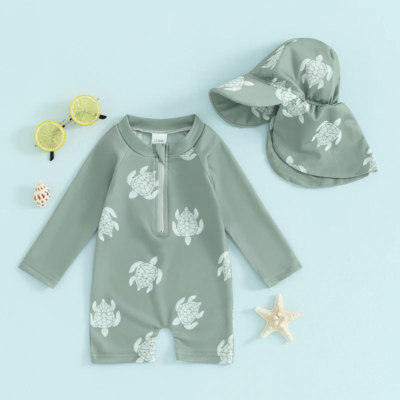 Baby boys rash guard set with turtle and dinosaur print by Baby Bubble, featuring long sleeves and vibrant ocean-themed designs.