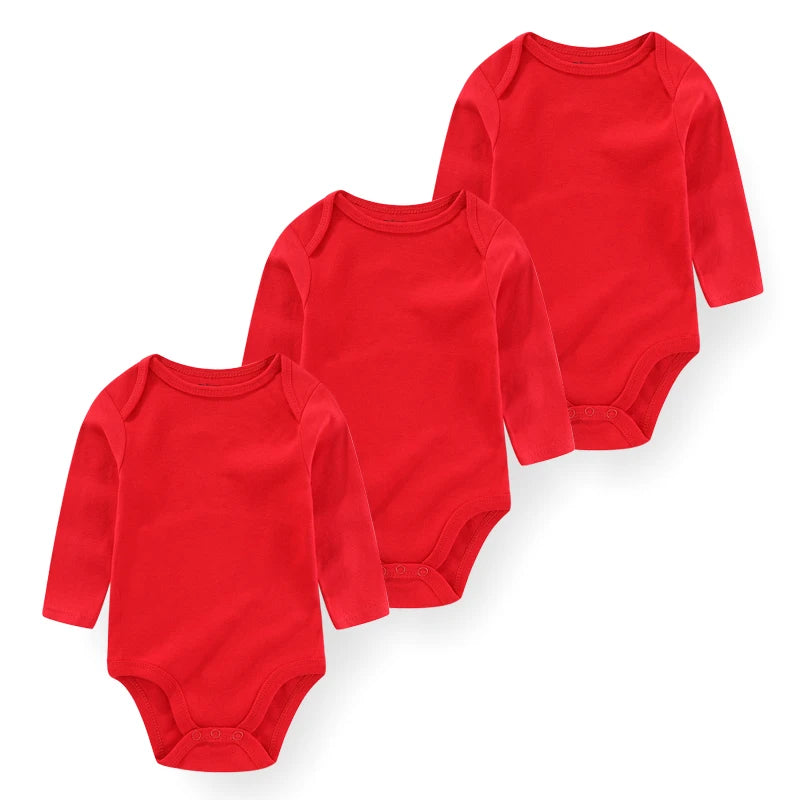 Set of three Baby Bubble newborn cotton bodysuits, soft and comfortable everyday onesies for infants, in pastel colors.