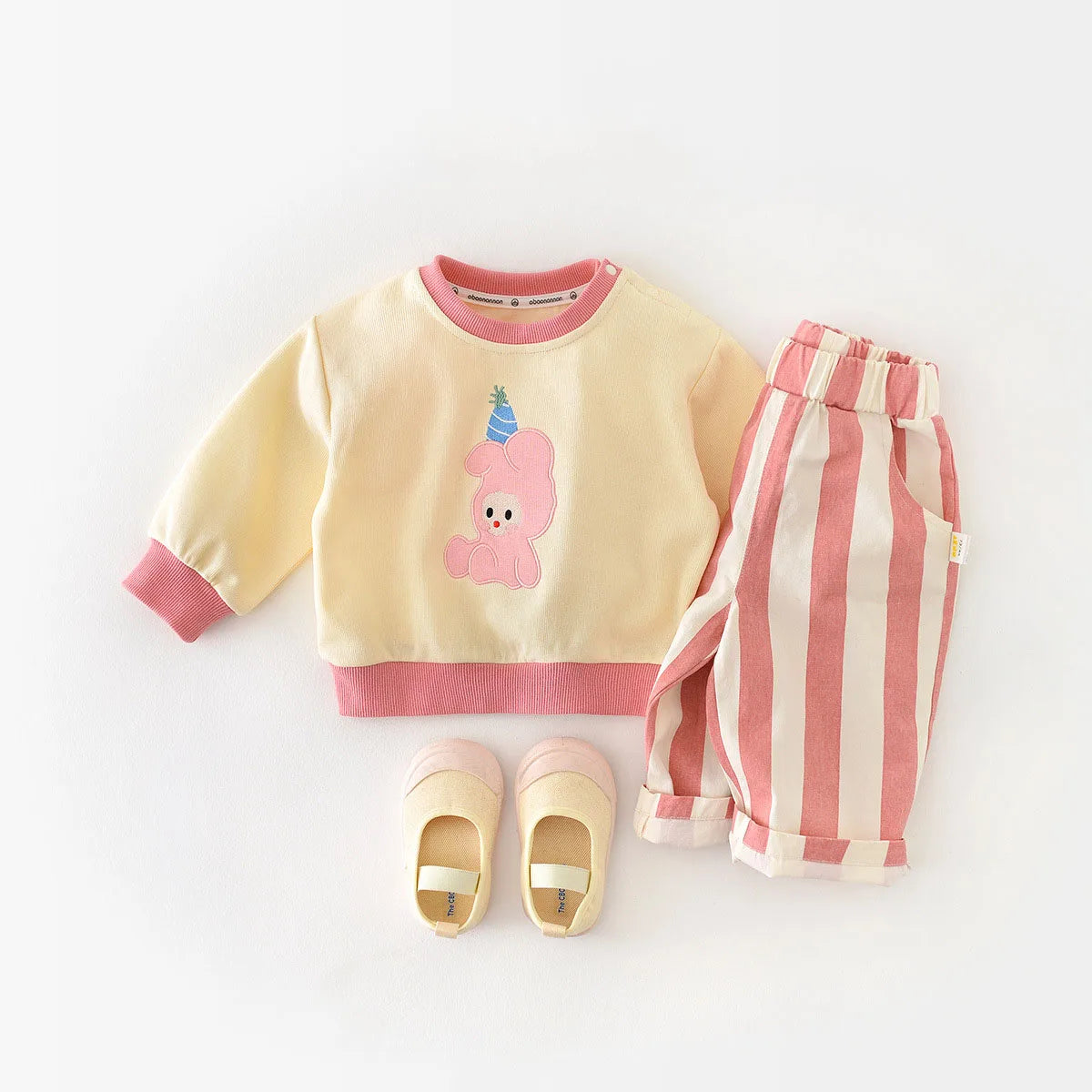 Korean style casual stripe pants by Baby Bubble, featuring a relaxed fit and bold vertical stripe pattern in neutral tones.