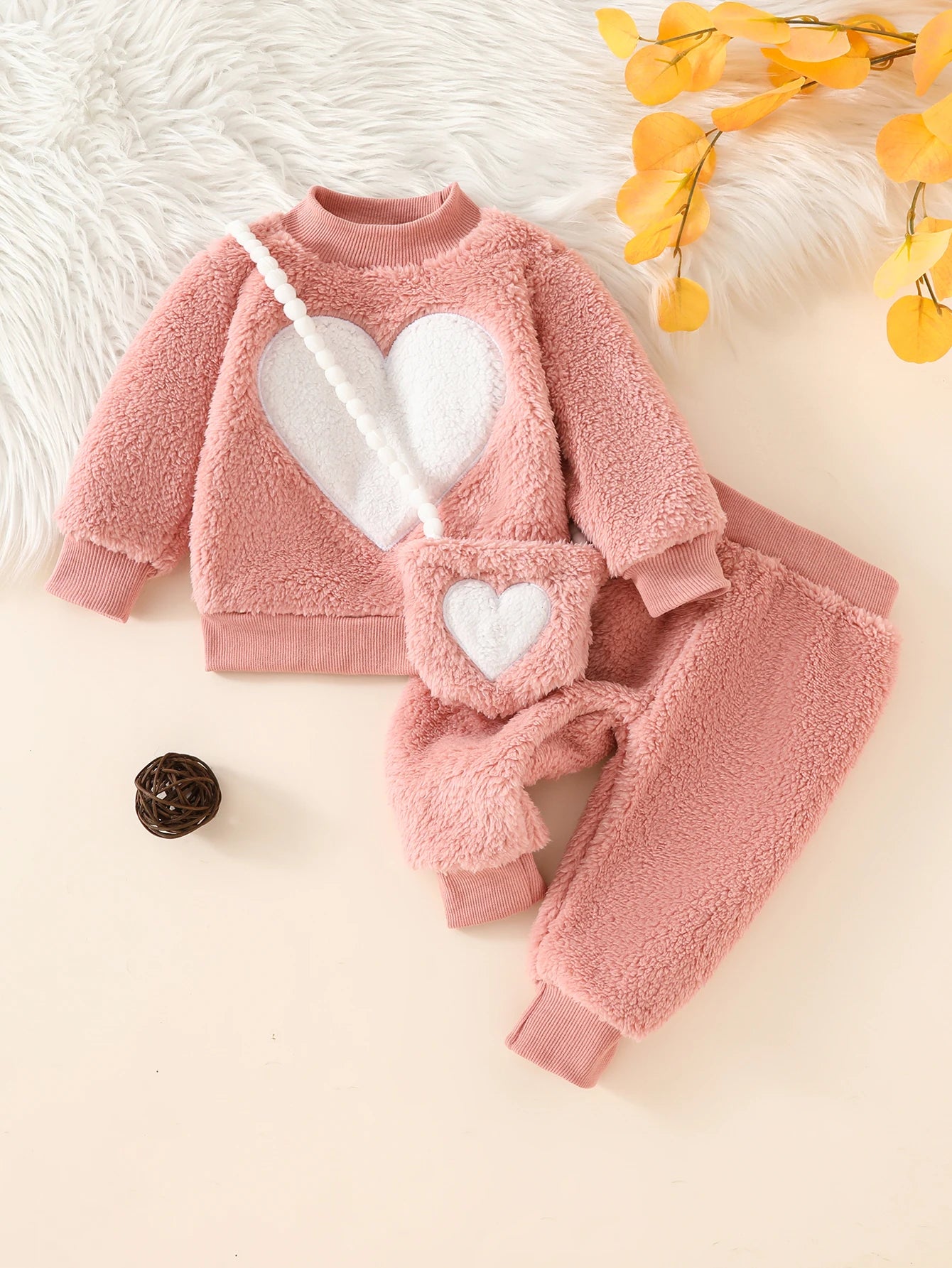 Baby Girl 3-piece fuzzy heart outfit set by Baby Bubble, includes a cozy top, pants, and hat with heart patterns.