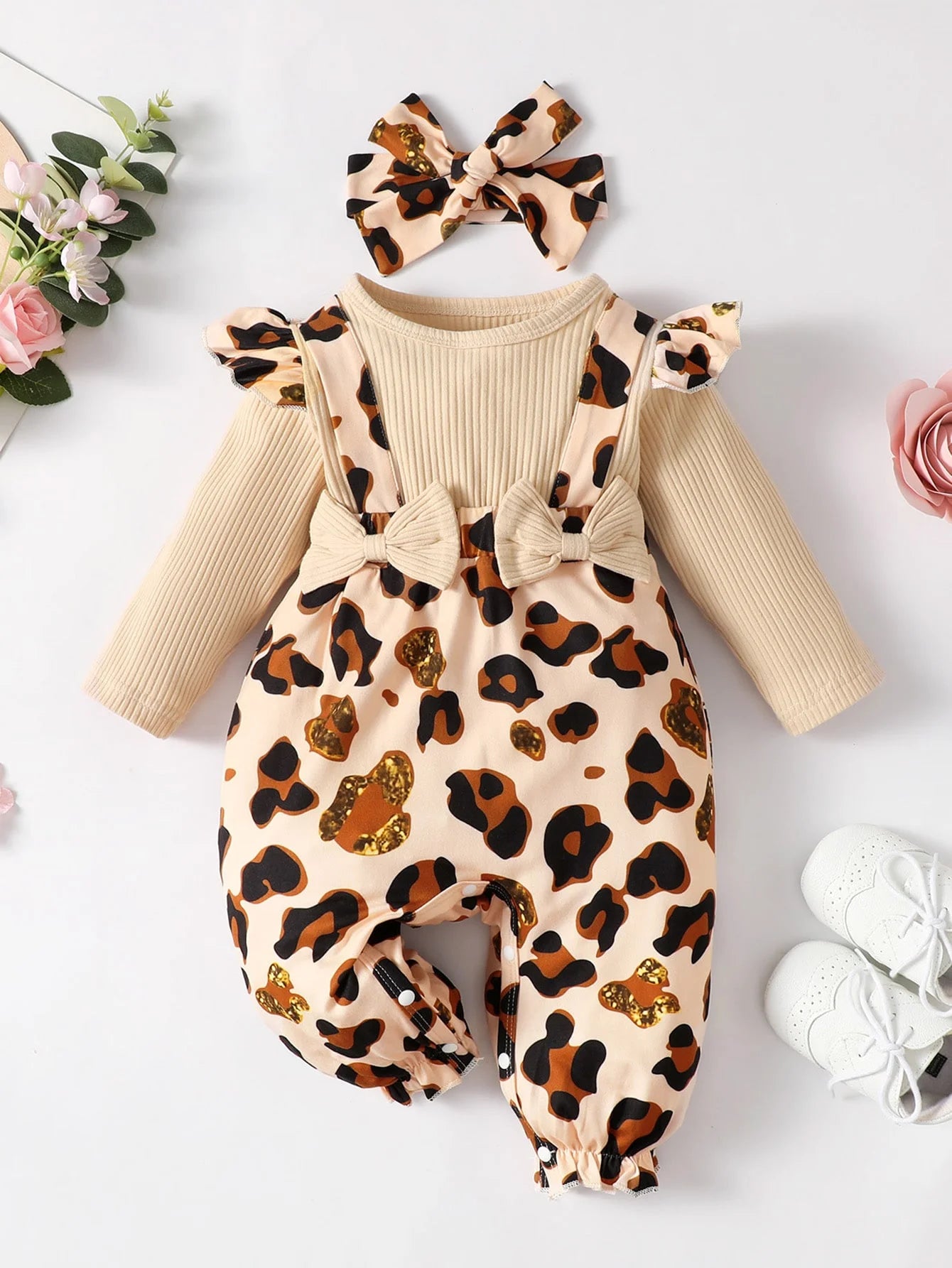 Baby Girl Leopard Jumpsuit Set by Baby Bubble with ruffle trim and matching headband, featuring a playful leopard print.