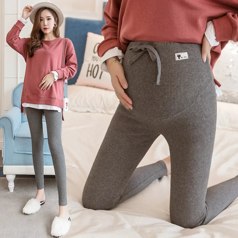 Adjustable maternity pants by Baby Bubble featuring a soft high waist design for comfort during pregnancy.