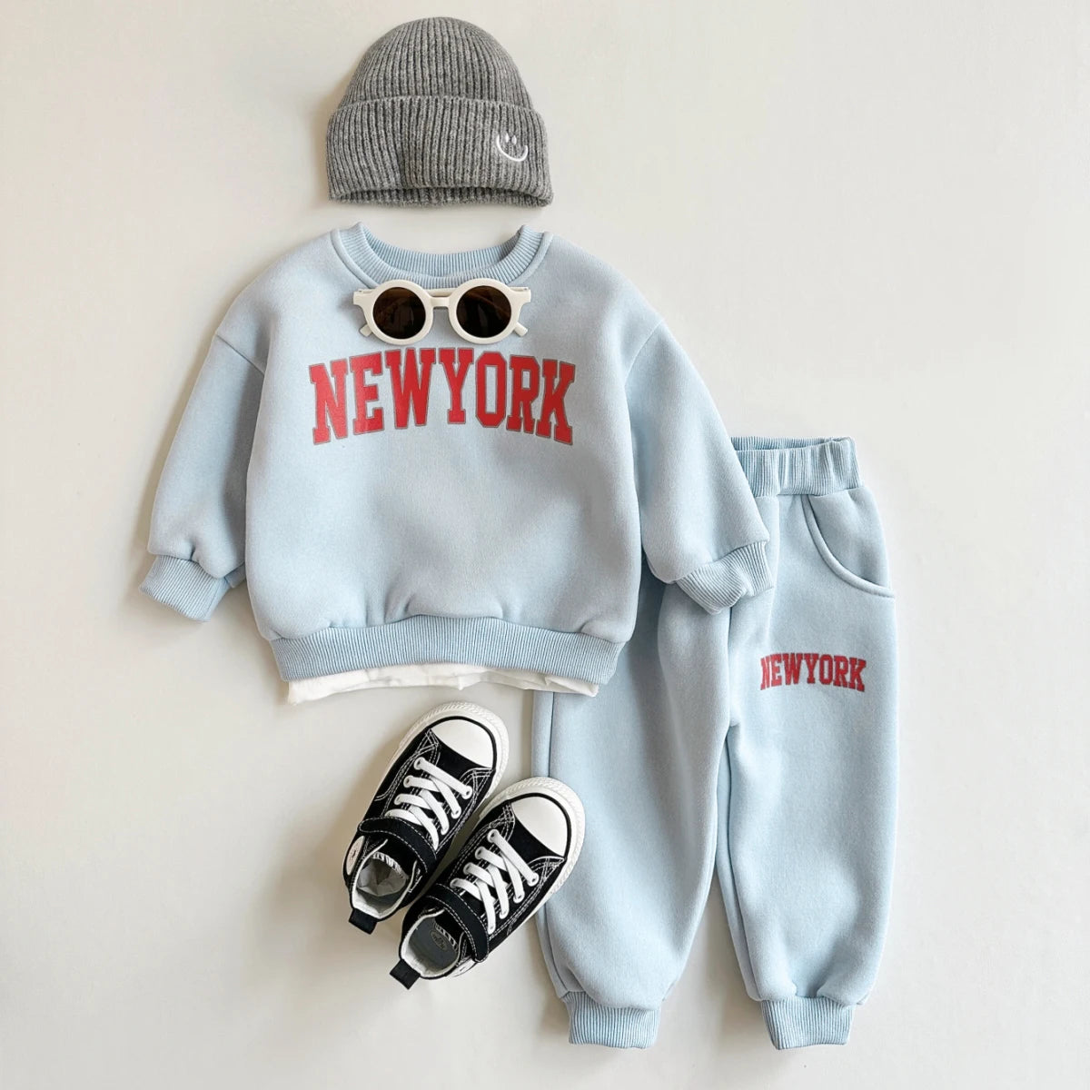 Baby Bubble baby winter outfit with a New York print top and matching pants, cozy and stylish for cold weather.